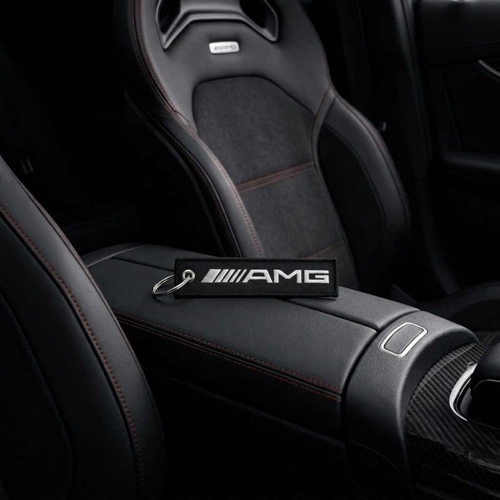 AMG Racing Keychain - on a sports seat